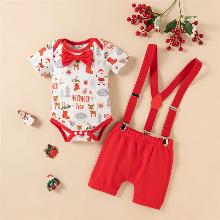 Festive baby outfit with red suspenders, red shorts, and Christmas print short sleeve bodysuit.