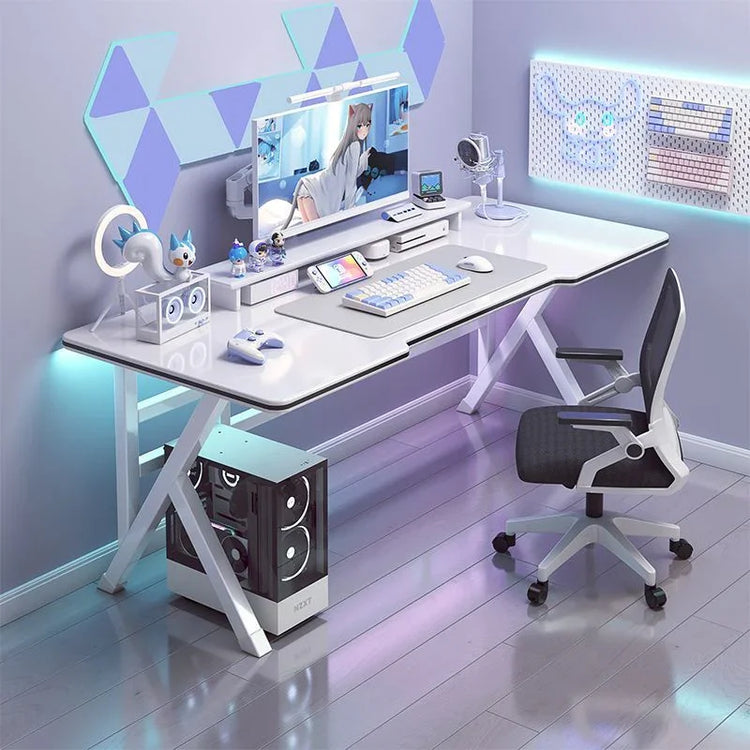 Modern minimal white gaming desk setup with LED lighting, mesh office chair, and tech accessories.