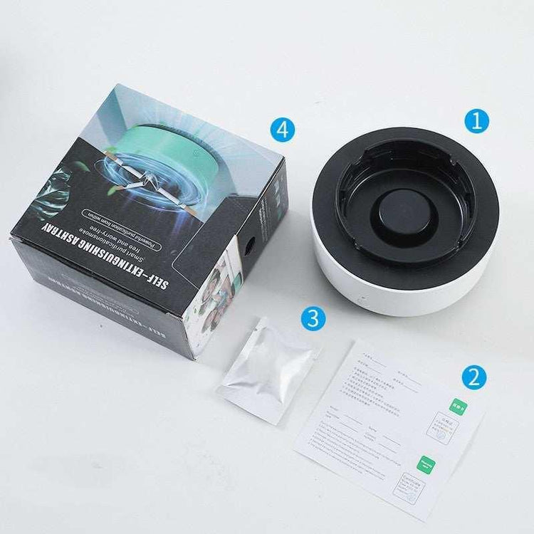 Modern black and white self-extinguishing ashtray with packaging, instructions, and accessory pack