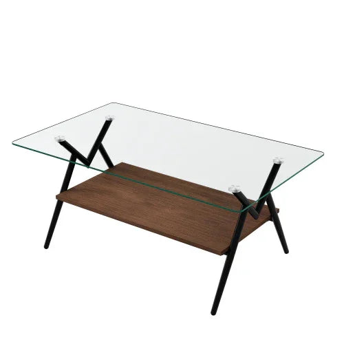 Modern coffee table with clear glass top, black metal legs, and wood lower shelf