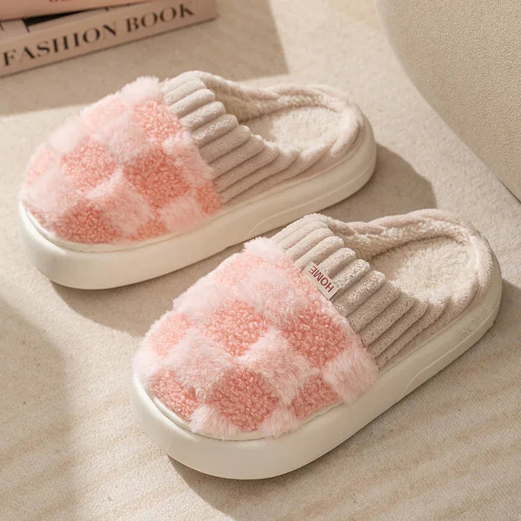 Cozy pink and beige checkered plush slippers with ribbed collar and thick sole, indoor style