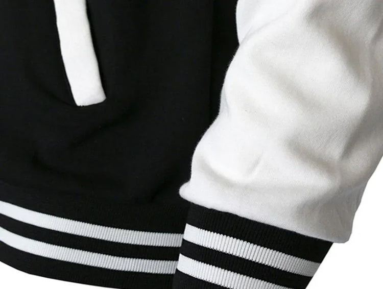 Black and white varsity jacket with striped ribbed cuffs and soft cotton material