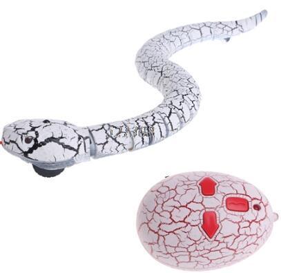 White and black crackle-pattern remote control snake toy with matching handheld controller