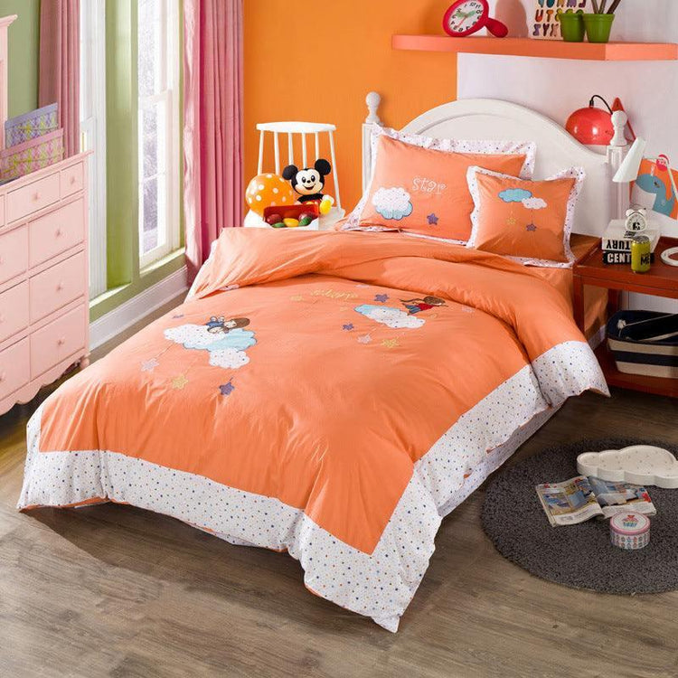 Orange cotton bedding set with cartoon and cloud prints, white polka dot trim, twin size fit