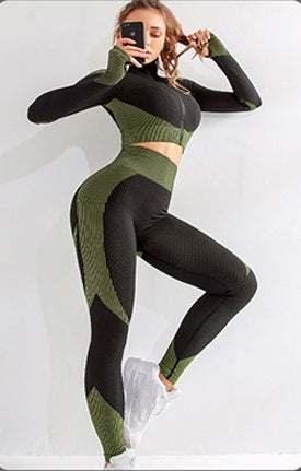 Woman modeling black and green textured two-piece athleisure set with slim fit