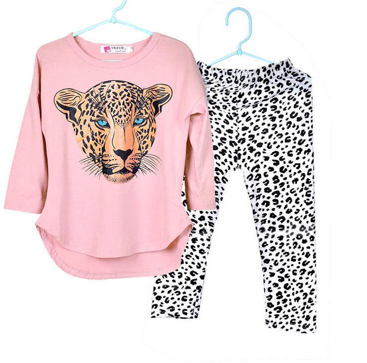 Pink long sleeve top with leopard face print and black and white leopard print leggings set