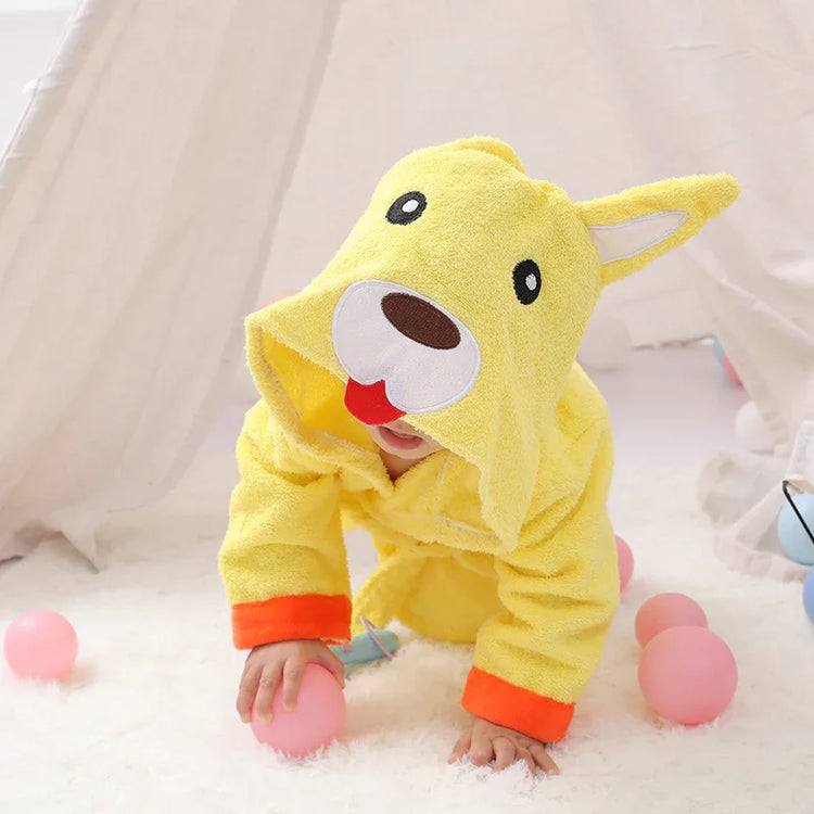 Baby crawling in yellow hooded animal romper, soft fleece material, loose fit, orange cuffs