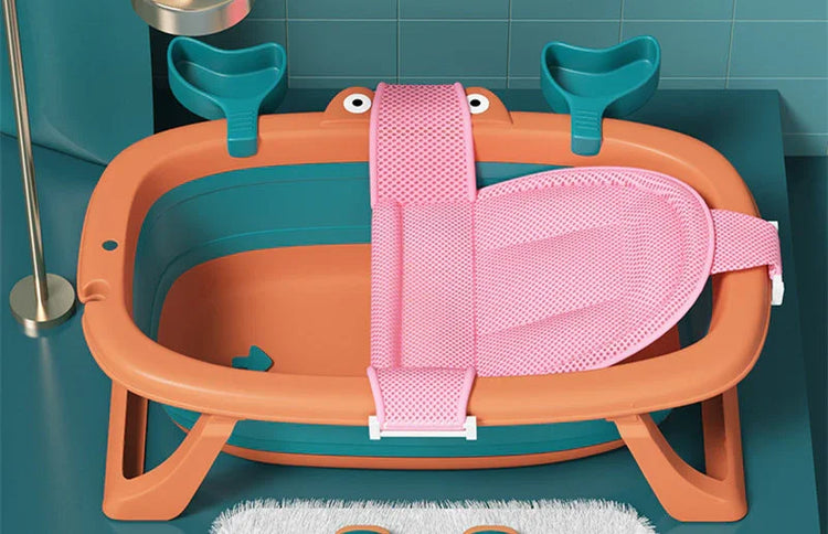 Modern orange and teal baby bathtub with pink mesh sling and sturdy foldable legs