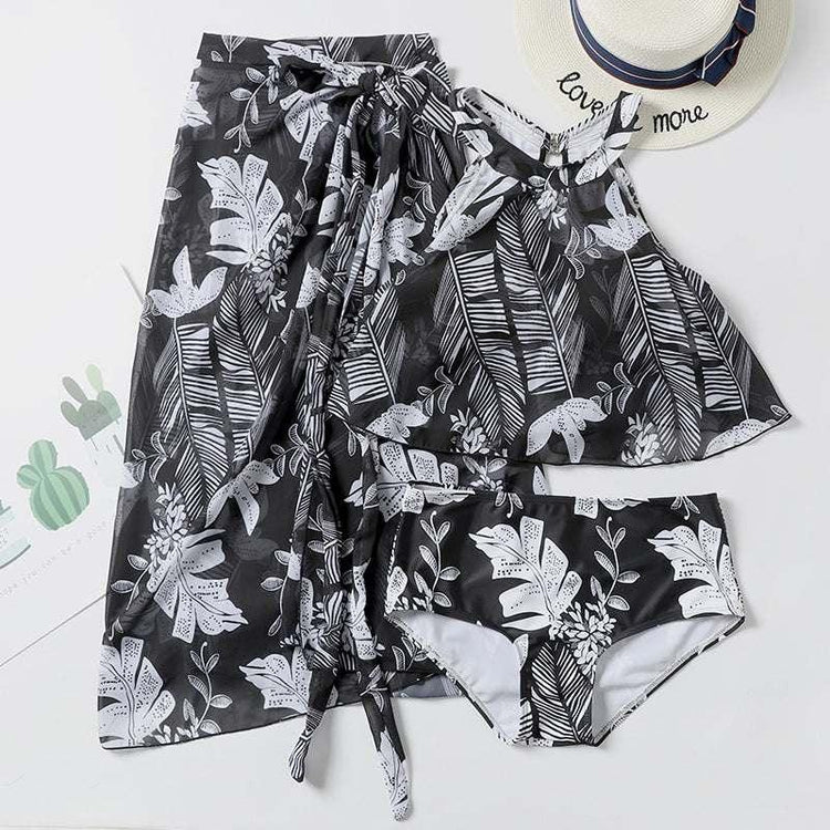 Black and white tropical floral print crop top, skirt, and swim bottom set, lightweight fabric, relaxed fit