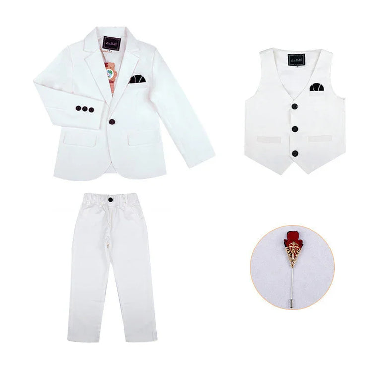 White kids formal suit set with blazer, vest, pants, and decorative lapel pin