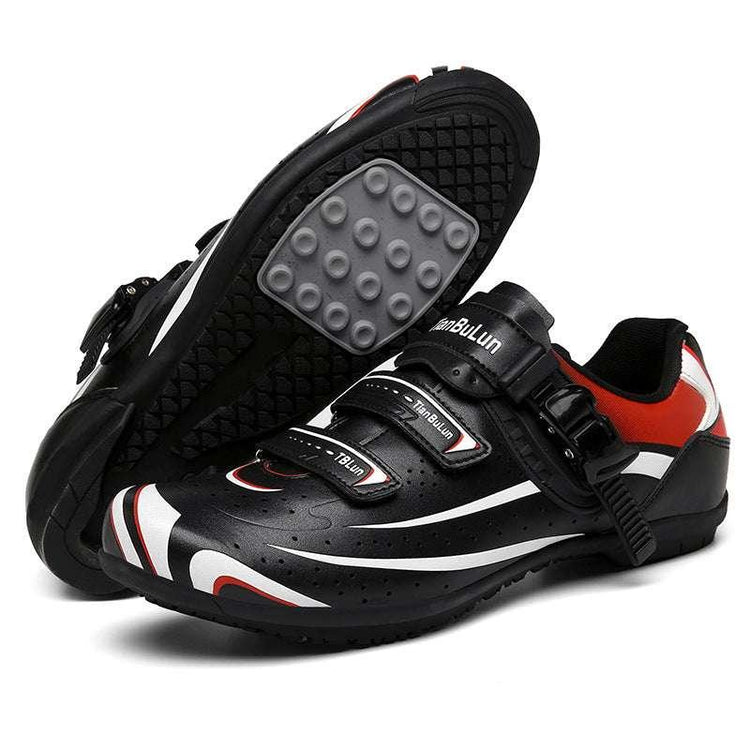 Black cycling shoes with red and white accents, synthetic material, secure velcro straps