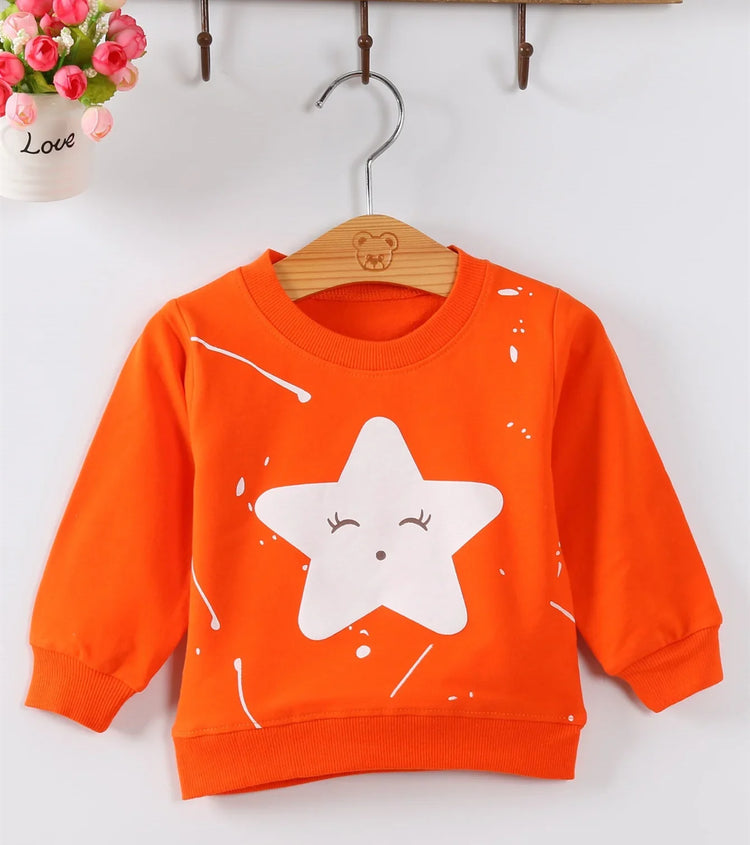 Bright orange cotton crewneck sweatshirt with a cute white star graphic and relaxed fit