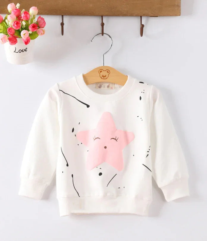 White cotton sweatshirt with pink star graphic and black splatter pattern, relaxed fit