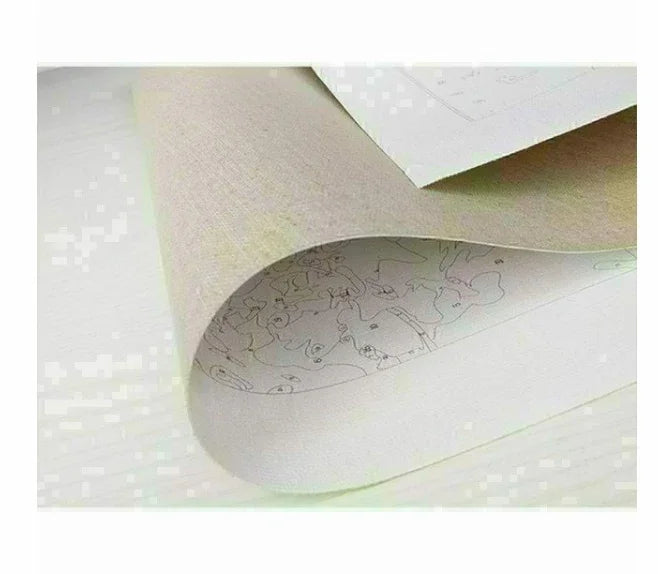 Close-up of a beige canvas material with an unfinished paint by numbers design, textured surface.