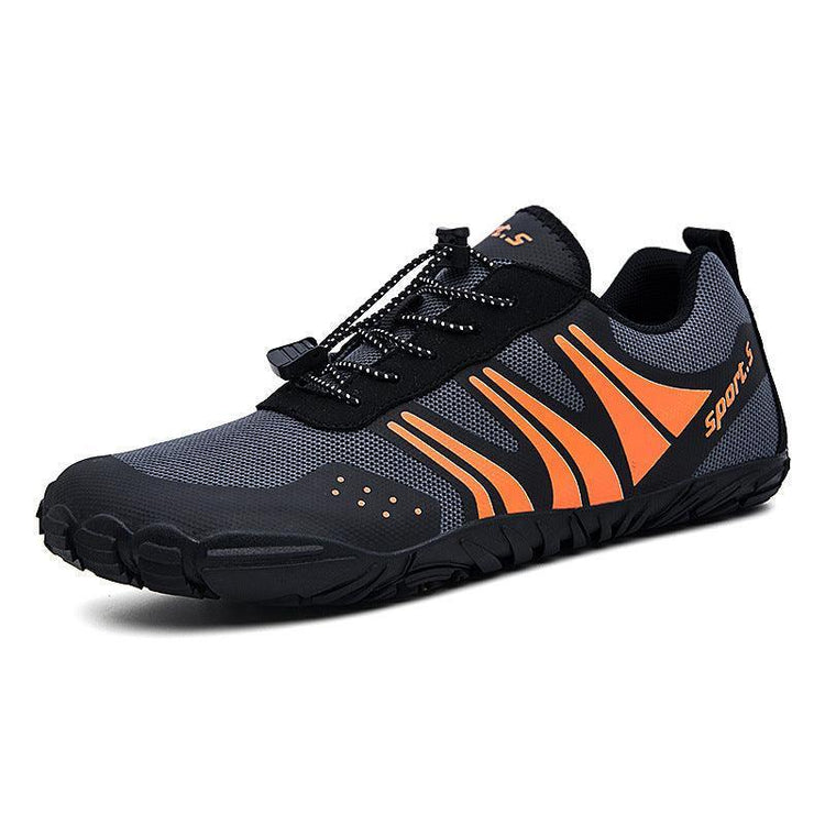 Black and gray athletic shoe with orange accents, mesh material, and sleek modern fit