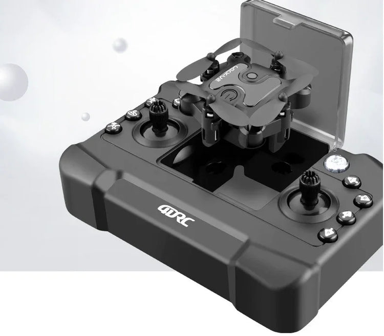 Compact black mini drone with foldable propellers shown on a matching controller