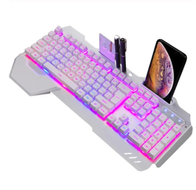 White mechanical keyboard with pink LED backlight, integrated phone holder, and accessory slots