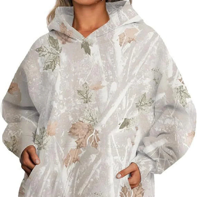 Oversized light gray hoodie with subtle leaf print, long sleeves, soft material, relaxed fit