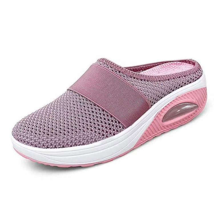 Pink slip-on mesh sneaker with breathable knit upper and cushioned sole