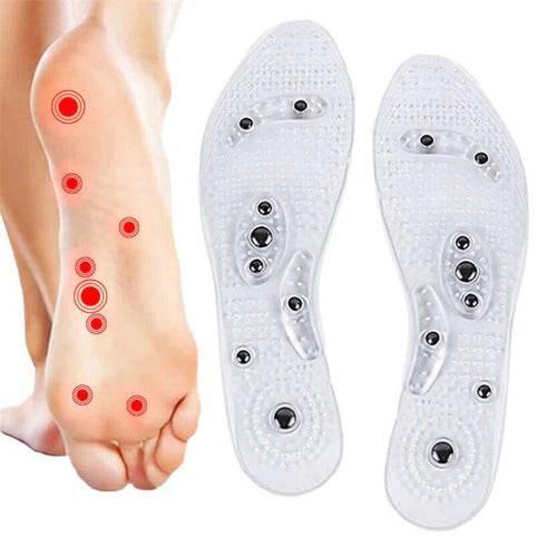 Transparent gel insoles with acupressure points, shown alongside a bare foot on white background.