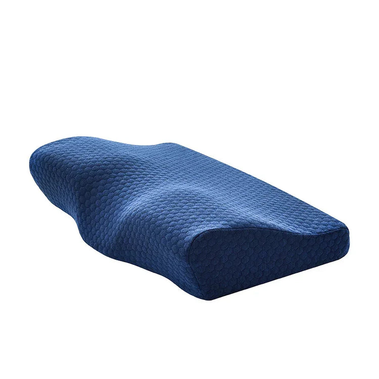 Ergonomic memory foam pillow with textured blue cover, contoured for neck support