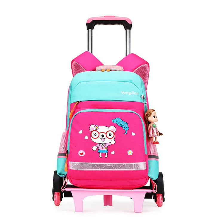 Pink and turquoise rolling backpack with cartoon bear print, mesh sides, and doll keychain accessory.