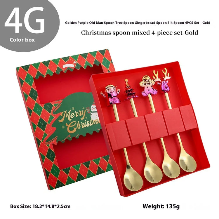 Gold stainless steel Christmas spoons with festive character handles in a red gift box.