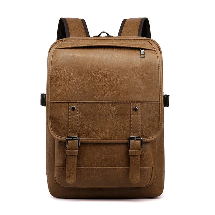 Brown faux leather backpack with front buckles, zipper pocket, and structured fit