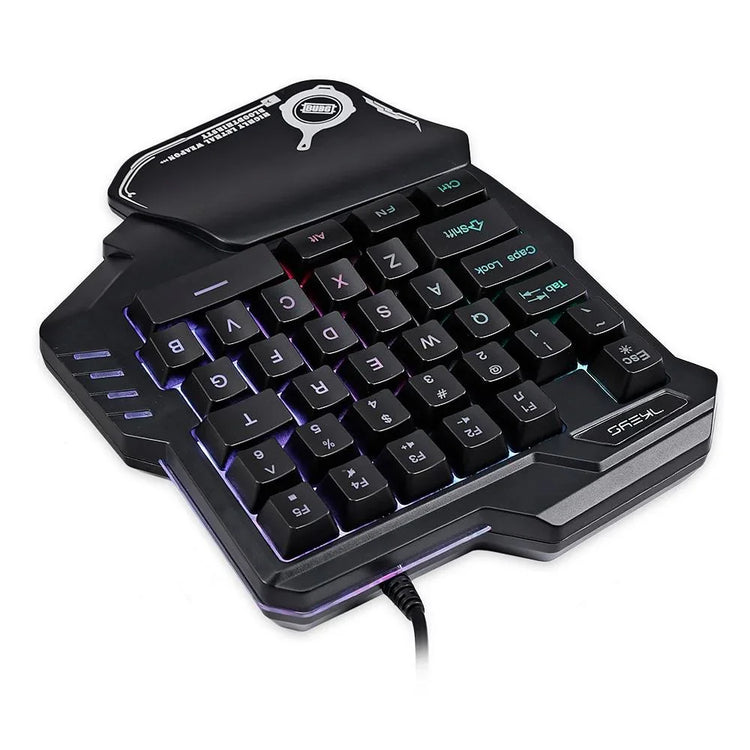 Black one-handed gaming keyboard with RGB backlighting and ergonomic wrist rest.