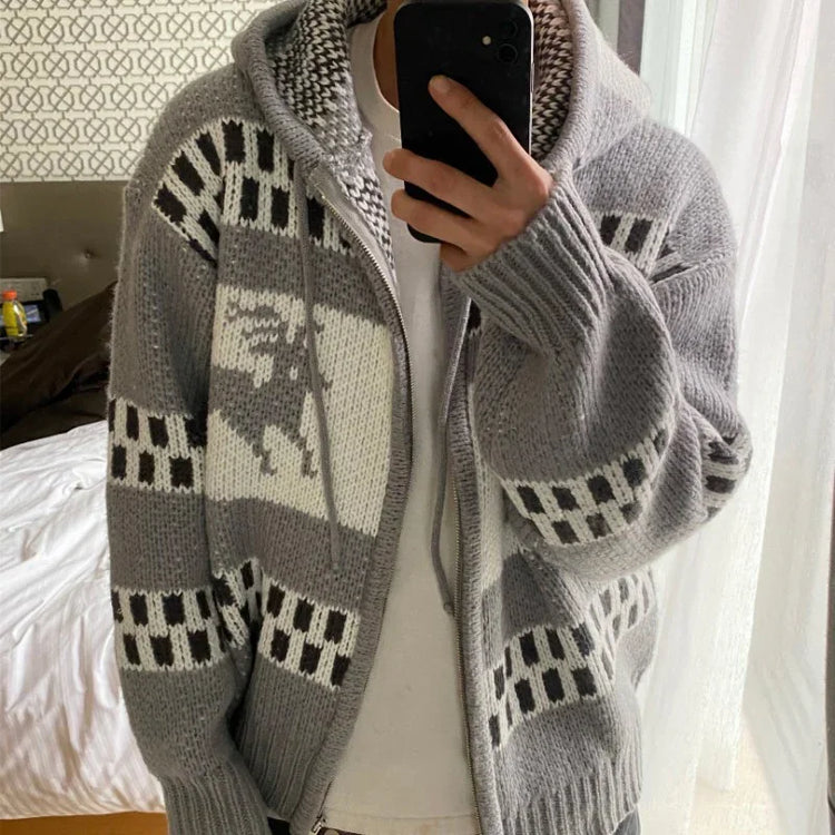 Oversized gray knit hoodie with black and white geometric pattern, relaxed fit