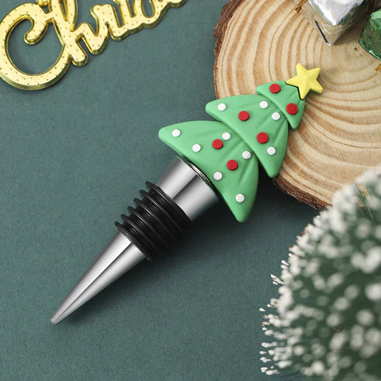 Christmas tree wine bottle stopper with green silicone top and stainless steel base
