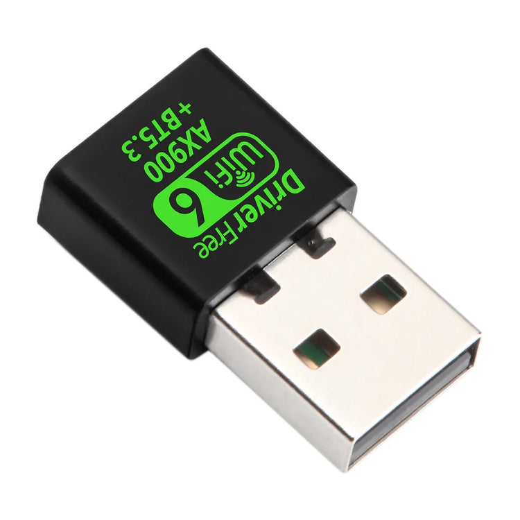 Compact USB WiFi 6 adapter in black with green text, metal connector visible.