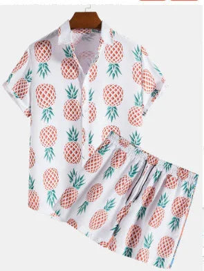 White short-sleeve shirt and shorts set with orange pineapple print, relaxed fit, lightweight material.