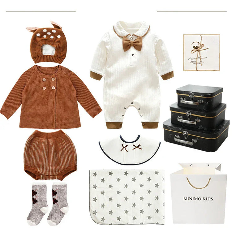 Brown and white baby knitwear set with cardigan, romper, animal hat, booties, and blanket