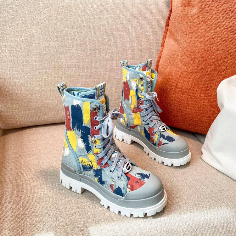 Chunky sole canvas boots with blue, yellow, and red paint splatter design, lace-up fit