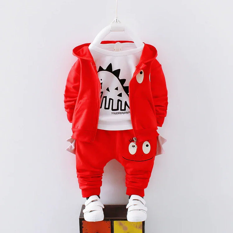 Red kids’ tracksuit set with cartoon dinosaur print, soft cotton, relaxed fit, playful details