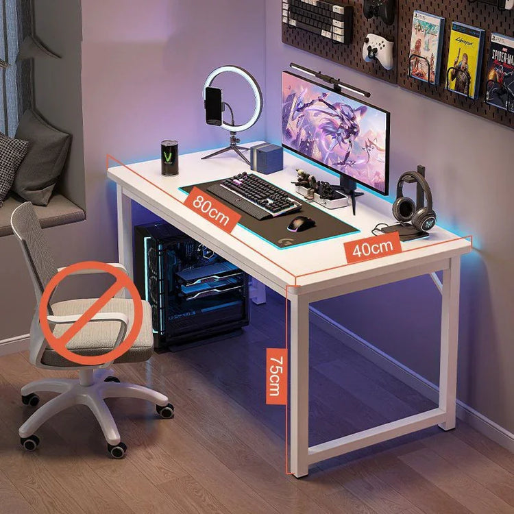 Minimalist white computer desk with RGB lighting, mesh office chair, and gaming setup in modern room