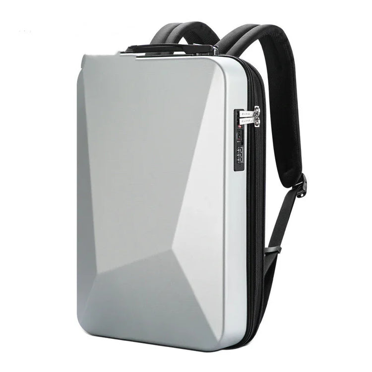 Futuristic hard shell backpack in metallic silver with geometric design and padded straps