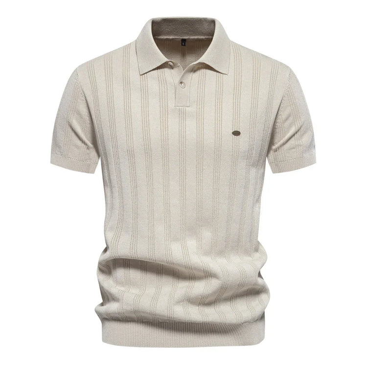 Beige knit polo shirt with vertical textured stripes, short sleeves, and slim fit.