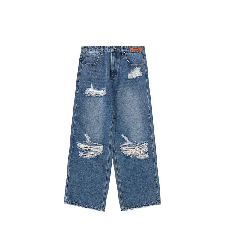 Wide-leg blue denim jeans with heavy distressing and ripped details, relaxed fit.