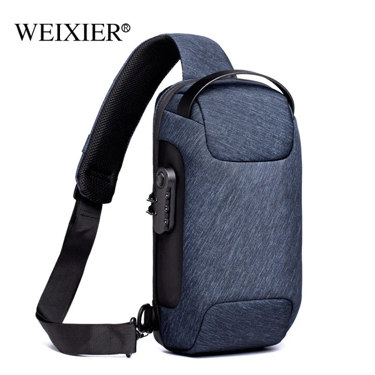 Modern blue crossbody sling bag with padded strap, textured fabric, and slim fit design
