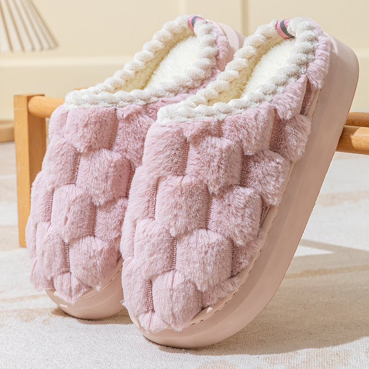 Plush pink slip-on slippers with textured faux fur and soft white fleece lining