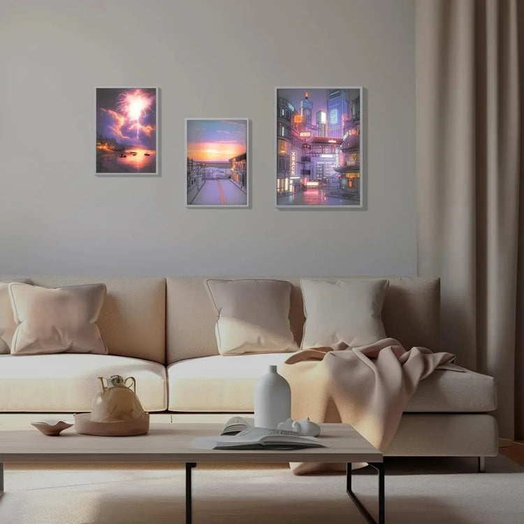 Modern living room with beige sofa, neutral throw blanket, and three colorful wall art pieces.