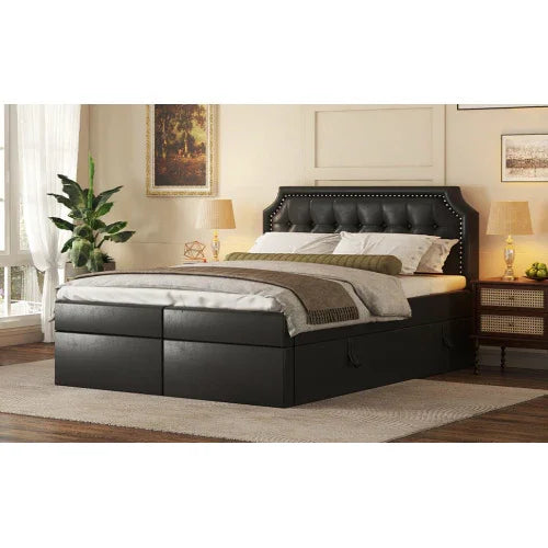 Modern black upholstered bed with tufted headboard, studded trim, and neutral bedding