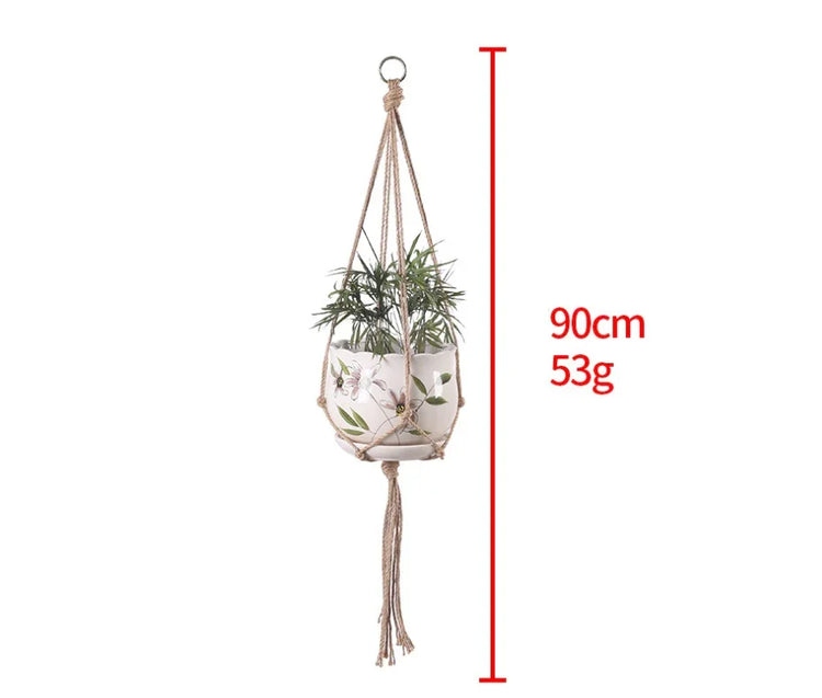 Natural rope plant hanger with 90cm length, holding a white floral ceramic pot