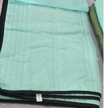 Light teal quilted jacket with black trim, lightweight streetwear, regular fit