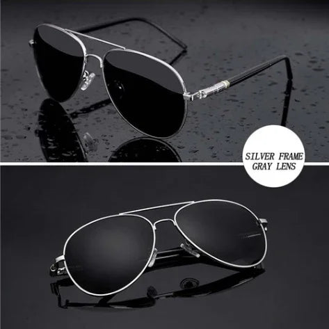 Aviator sunglasses with silver metal frame and gray lenses, sleek modern design, reflective finish.