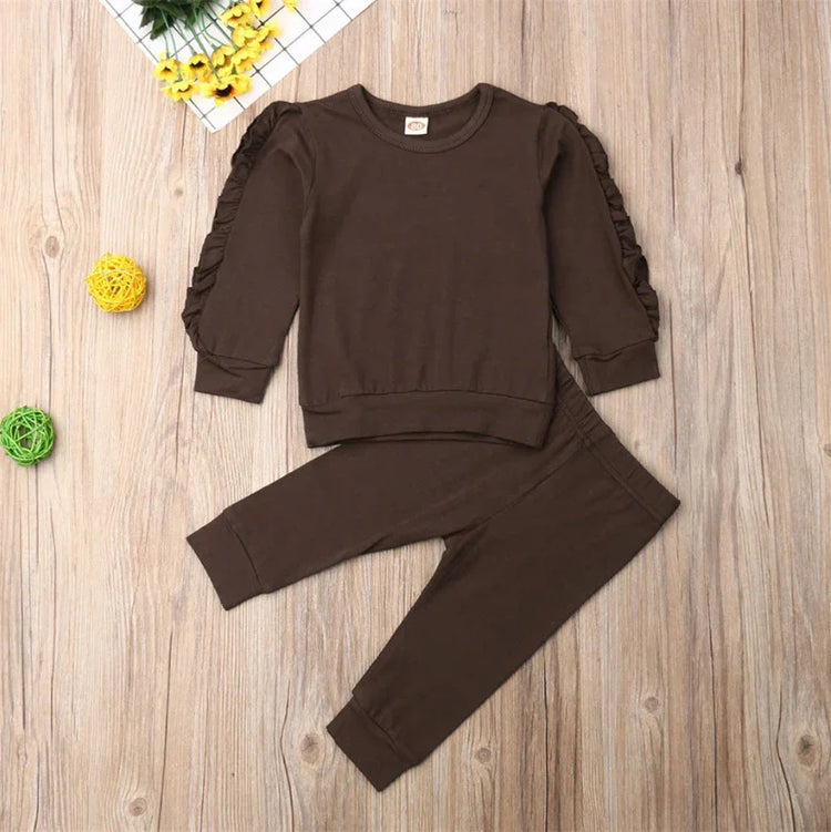 Brown long-sleeve ruffled sweatshirt and matching pants set, soft cotton, relaxed fit.
