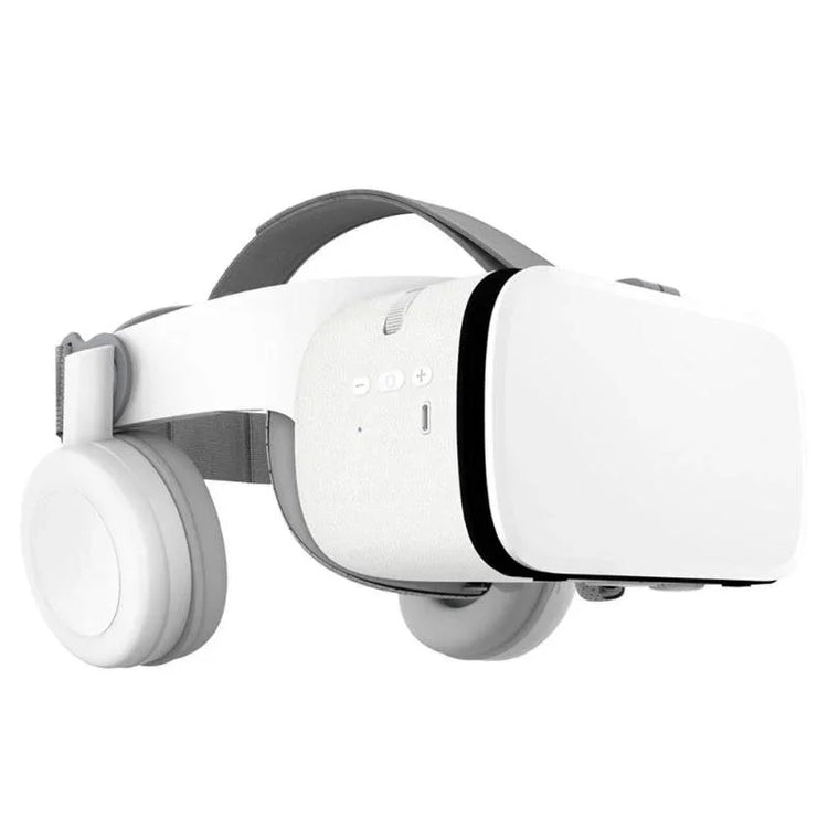 White virtual reality headset with padded headphones and adjustable strap on a plain background