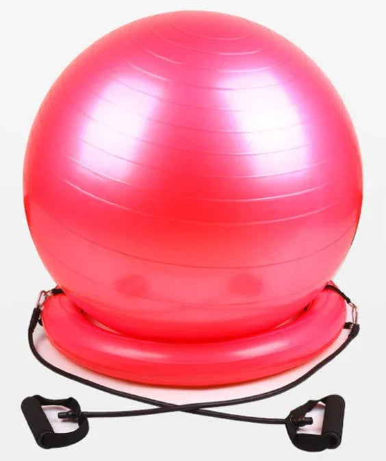 Pink stability balance ball with resistance bands, glossy texture, fitness equipment